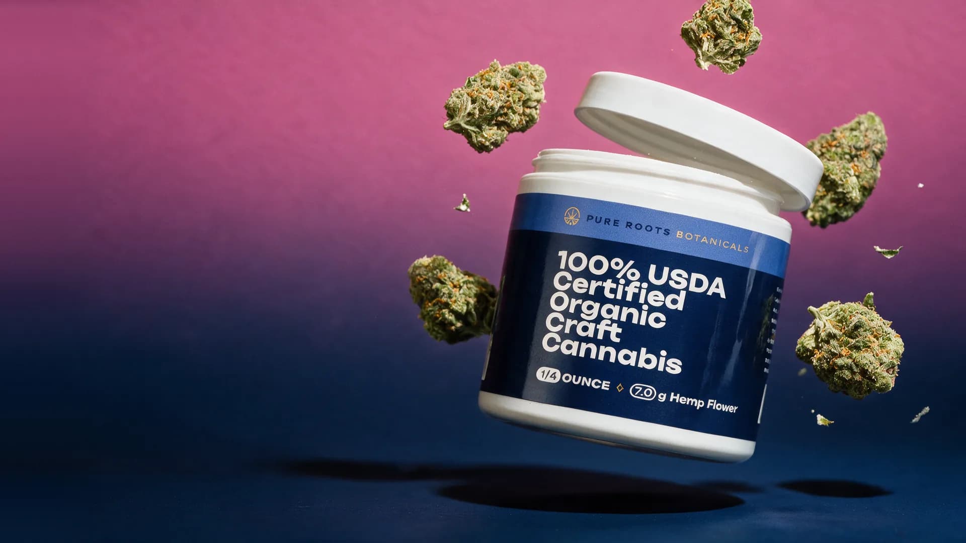 A Pure Roots Gelato Sorbet flower jar floating mid-air with its lid popped off and buds around it, on a pink to navy backdrop