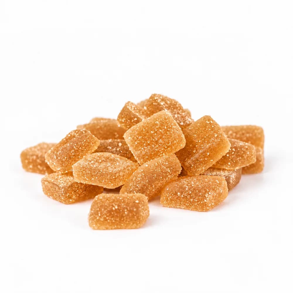 Close-up of sugar-coated Pink Lemonade Delta-9 gummy squares