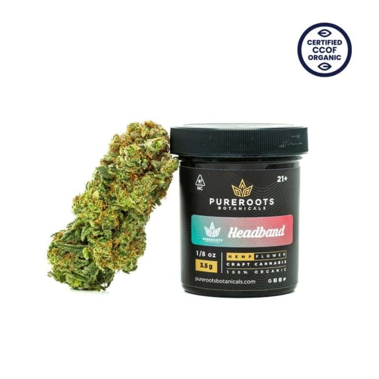 Headband hemp bud displayed next to its packaging label, showcasing frosty trichomes and deep green tones.