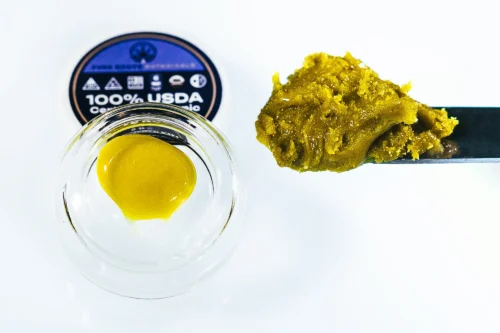 Blackberry Truffle Live Rosin concentrate by Pure Roots Botanicals, shown with USDA Organic certification label and terp-rich golden extract in a glass jar
