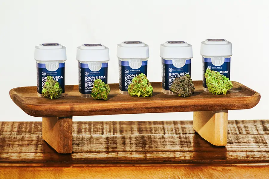 How Is THCA Flower Made? (How Is It Grown?) 2 5 Different thca strains placed next to their containers